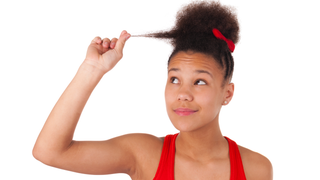 Salon Tells Black Women to 'Straighten Up' Hair